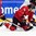 HELSINKI, FINLAND - DECEMBER 30: USA's Christian Dvorak #11 battles for the puck with Switzerland's Noah Rod #26 in front of Joren Van Pottelberghe #30 during preliminary round action at the 2016 IIHF World Junior Championship. (Photo by Matt Zambonin/HHOF-IIHF Images)

